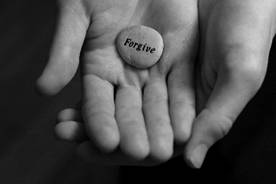 handswhiteholding-forgiveness-stone.jpg